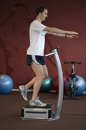 Whole body vibration therapy instructed by a physio for rehab